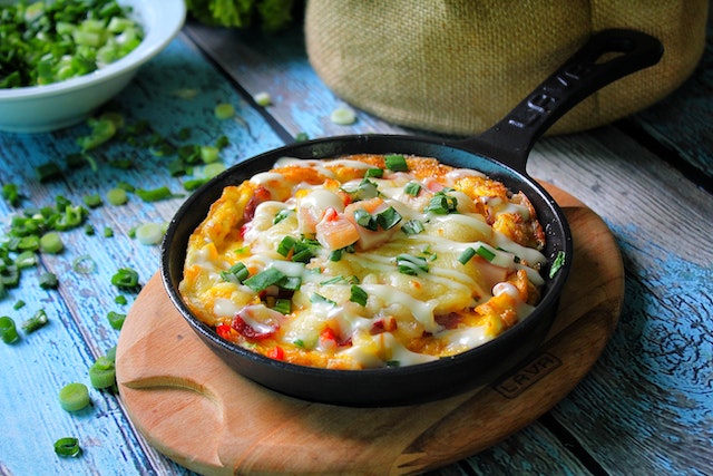 ham and vegetable frittata on a skillet