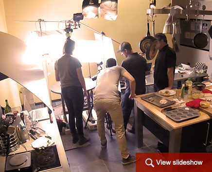 four men taking a photo in a photoshoot